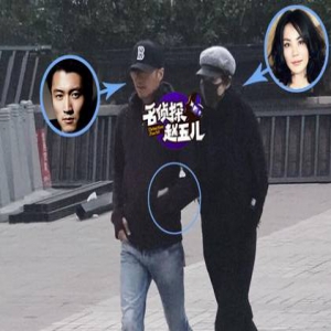 撒娇甜到爆！王菲手插谢霆锋口袋取暖