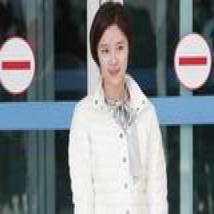 穿长靴露腿冻哭你 与裤装配才是正解