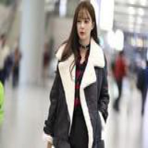 华语女星机场街拍 倪妮裹成球何洁秀美腿