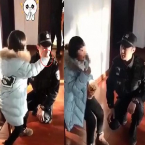 暖心！走失女孩被民警公主抱回派出所 霸道喂对方爆米花